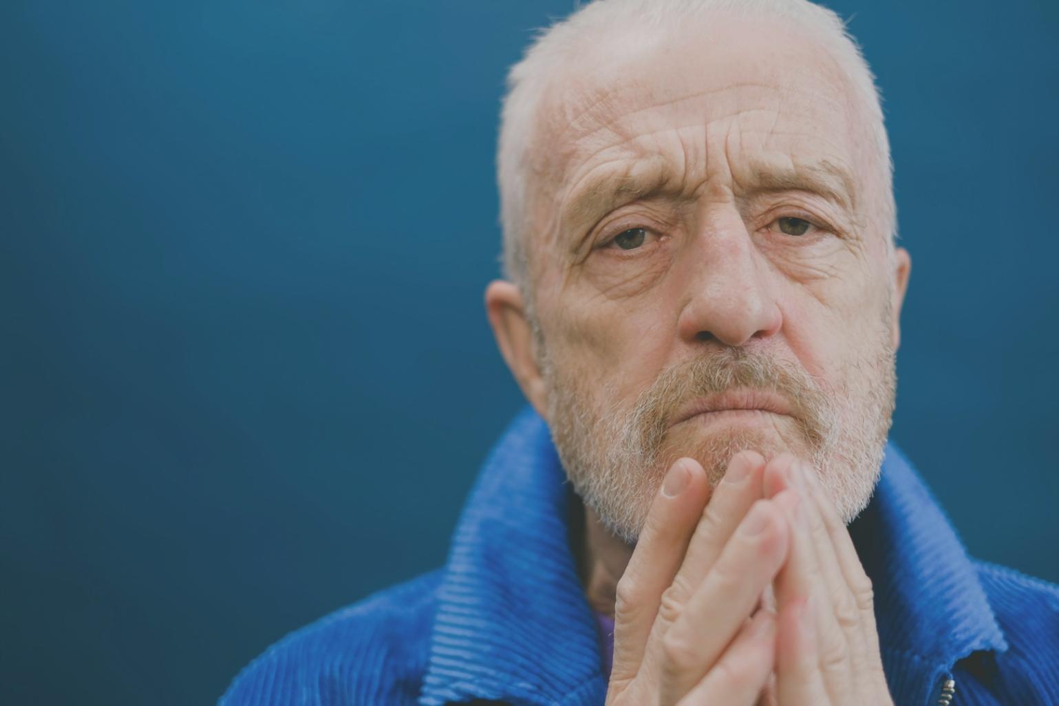 Support coordinator reviewing care plan with elderly client